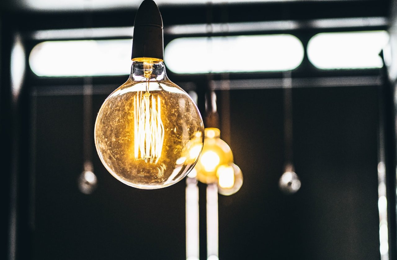 tilt shift lens photography of clear glass bulb