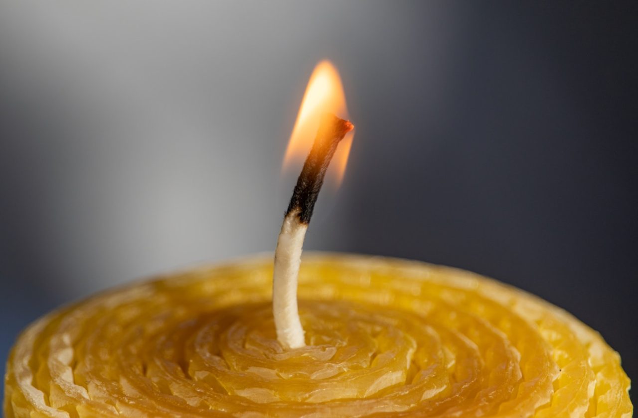 a burning match in a lemon