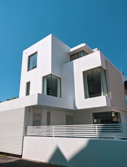 white concrete building under blue sky during daytime